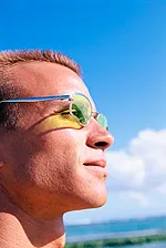 man wearing glasses in the sun