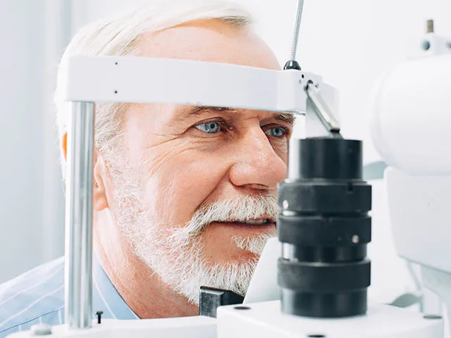 Senior Patient Receiving Eye Exam At Clinic, Eyesight Examinatio