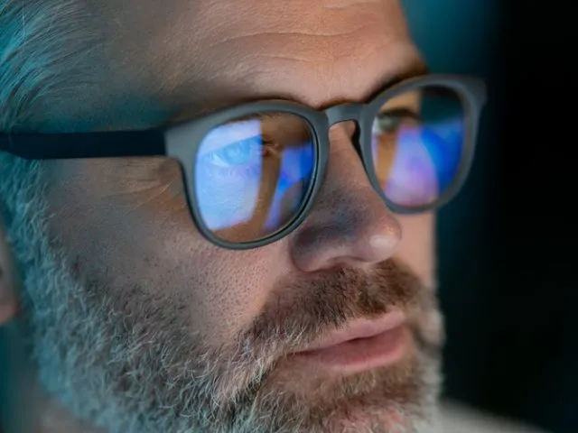 Close up,Of,Mature,Man,With,Glasses,Focused,On,Computer,Screen,